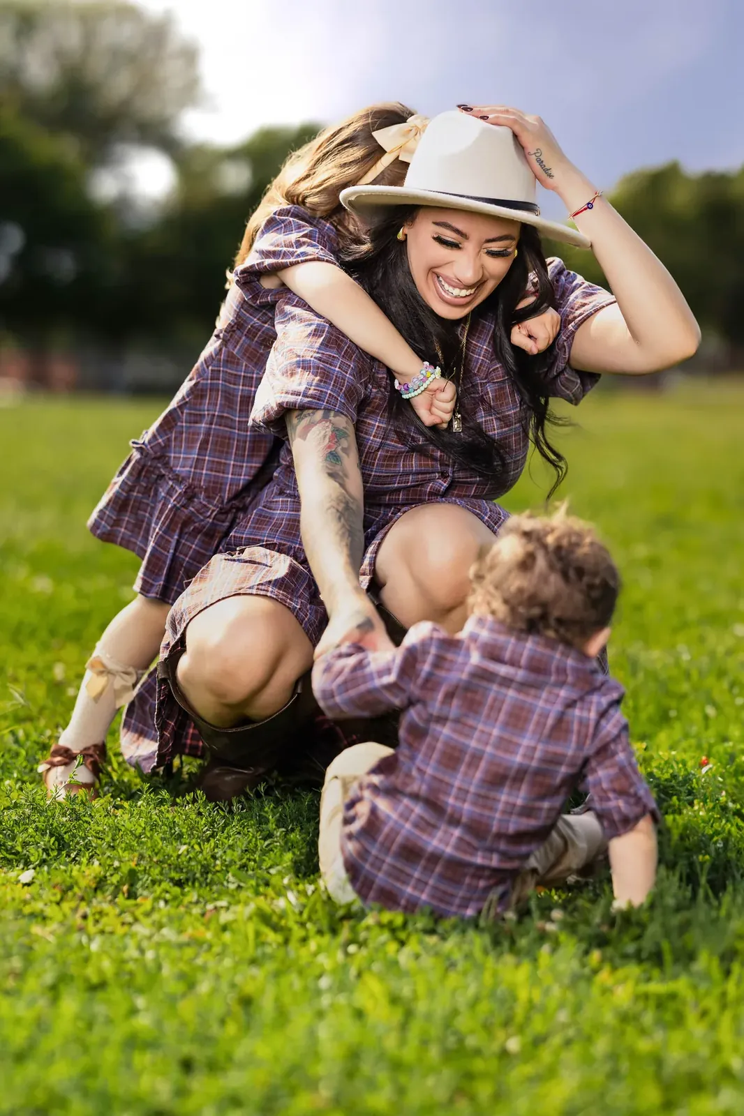 Mother and toddler laughing during a family session