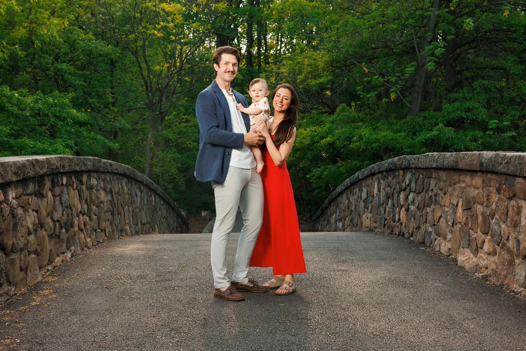 Family portrait on a stone bridge, Staten Island, Xclusive Events Photography